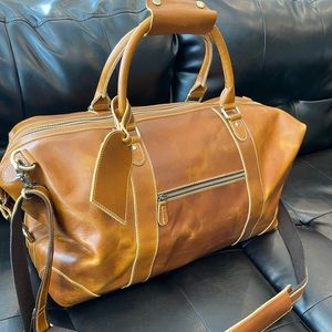 Viosi Leather Duffle Bag. Brand New! Expandable